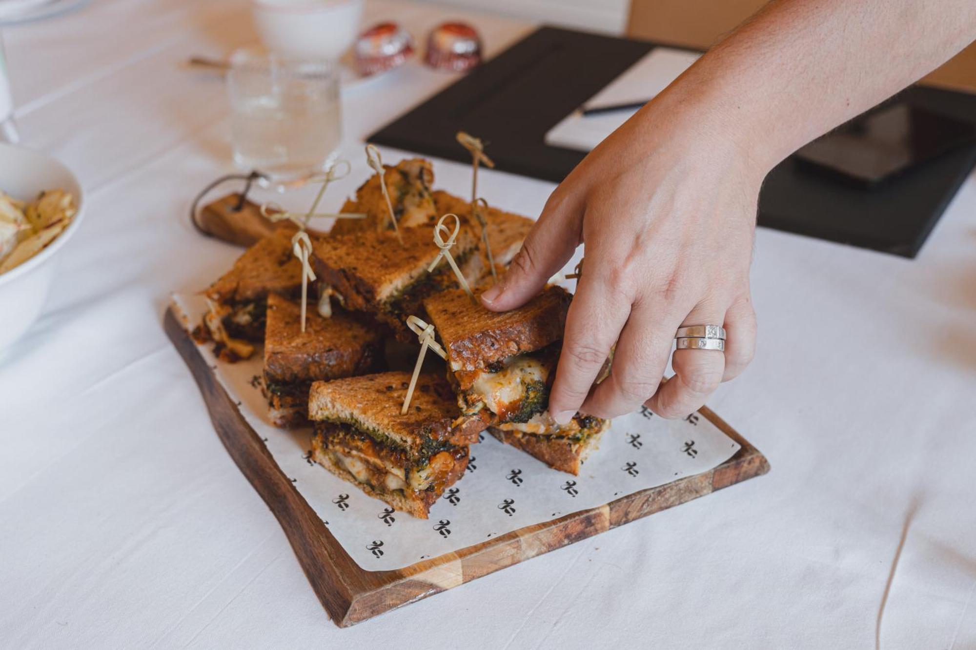 No 15 By Guesthouse, Бат Екстериор снимка A hand picking up a canapé